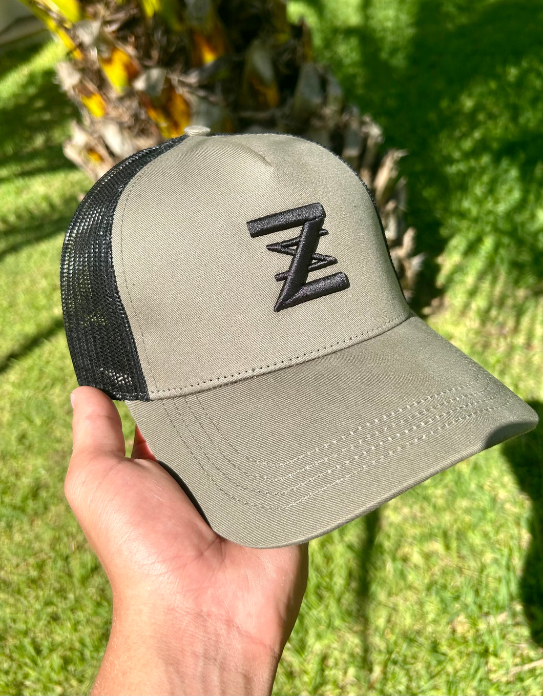 Khaki & Black logo cap.