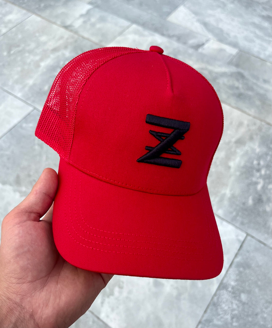 Red & Black logo cap.