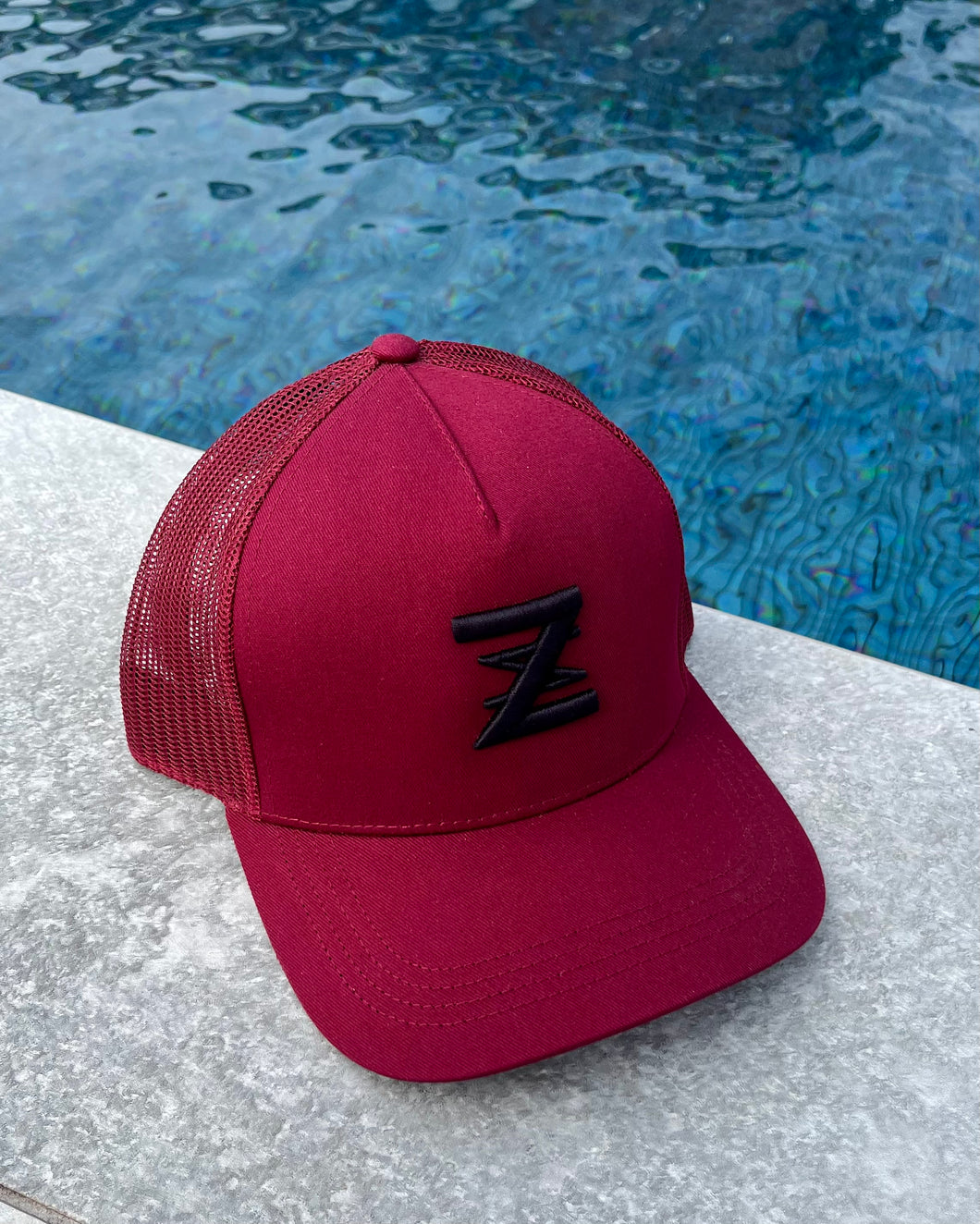 Burgundy & Black logo cap.